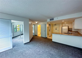 Welcome to One Kalakaua Apt 305 featuring an open concept floor plan, creating space and convenience.