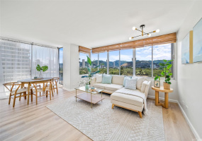 Fully Renovated Living and Dining Area with Unobstructed Views of Mountains and Ala Wai Canal