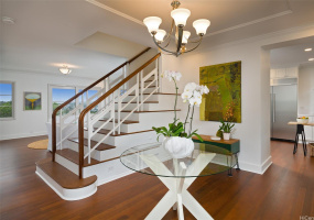 Welcome to this Manoa charmer! This home exudes a timeless charm from the moment you step into the grand entry.