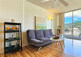Spacious living room w/ large lanai and cool Mountain view.