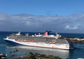Honolulu Harbor views from your lanai & living room welcoming Carnival Cruises.